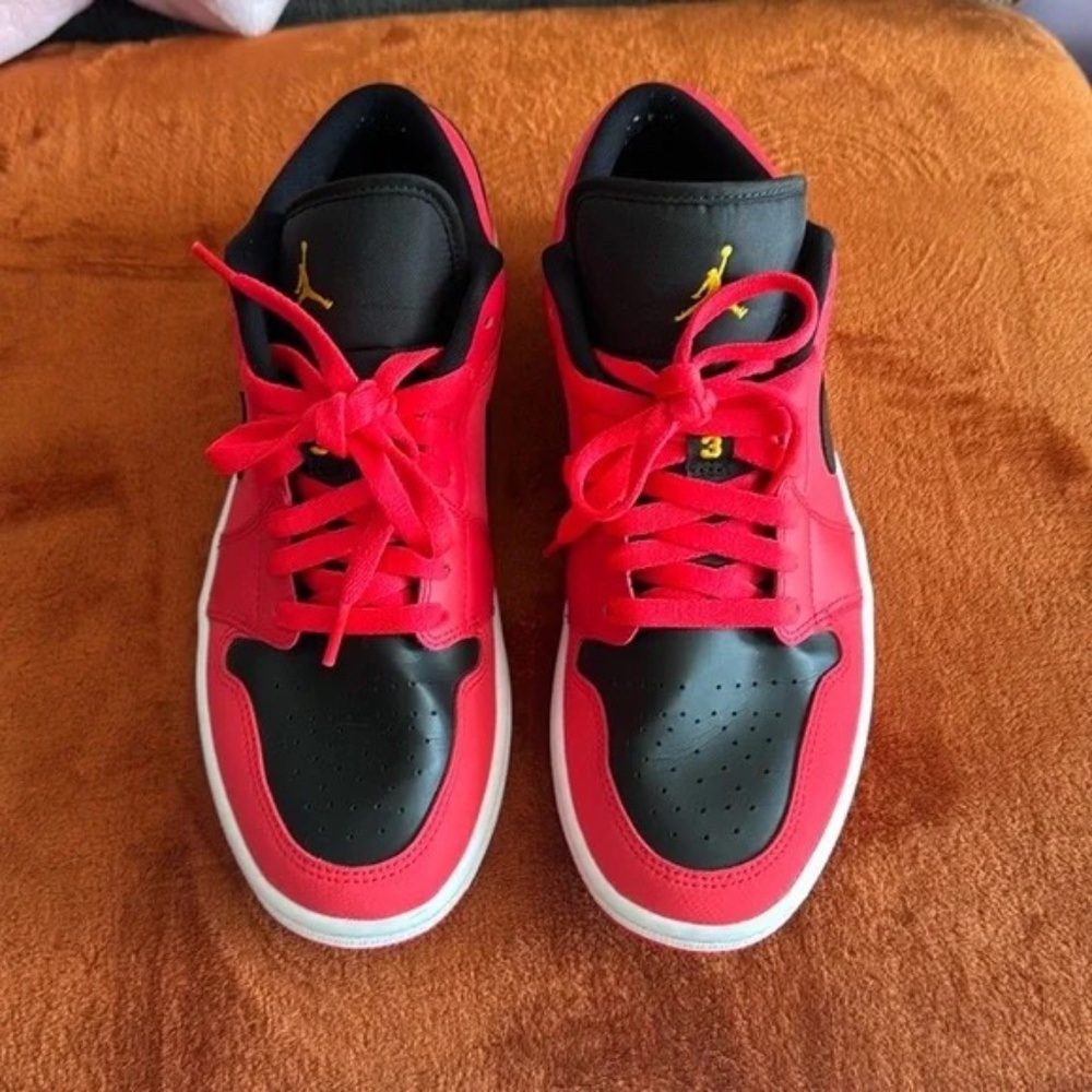 Air Jordan low red and black.